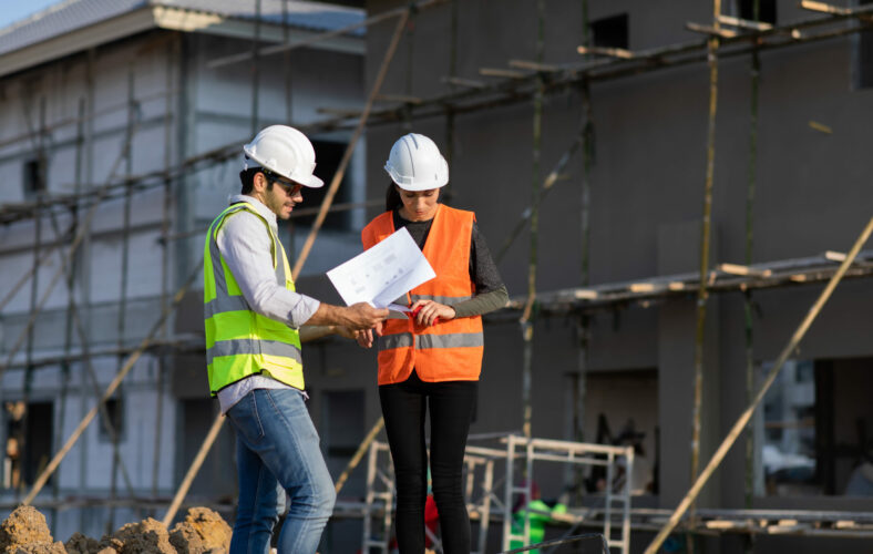 Professional Mechanical Engineer team Working on construction site.  Home building Project quality Inspection